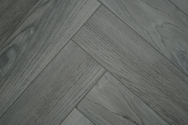 Cosmo Grey Herringbone Laminate Flooring 12mm By 101mm By 606mm