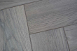 Cosmo Grey Herringbone Laminate Flooring 12mm By 101mm By 606mm LM084 3