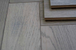 Cosmo Grey Herringbone Laminate Flooring 12mm By 101mm By 606mm LM084 1